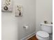 Elegant half-bathroom featuring refined fixtures, neutral decor, and a modern toilet, creating a serene atmosphere at 3529 Xanthia Ct, Denver, CO 80238