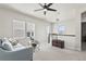 Upstairs bonus room with plenty of natural light and neutral decor at 3529 Xanthia Ct, Denver, CO 80238