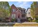 Charming two-story home with brick accents and a cozy front porch at 3529 Xanthia Ct, Denver, CO 80238