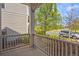 Cozy covered front porch view showing the surrounding landscape and neighborhood street at 3529 Xanthia Ct, Denver, CO 80238