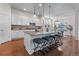 Spacious kitchen with granite countertops, seating, and stainless steel appliances at 3529 Xanthia Ct, Denver, CO 80238