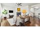Comfortable living area with hardwood floors, modern decor, and a ceiling fan at 3529 Xanthia Ct, Denver, CO 80238