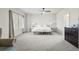 Bright main bedroom with natural light and neutral decor at 3529 Xanthia Ct, Denver, CO 80238
