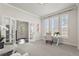 Bright and airy office space with french doors, plantation shutters, and neutral carpet at 3529 Xanthia Ct, Denver, CO 80238