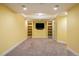 Spacious finished basement with recessed lighting, shelving, and neutral carpeting at 4939 Silver Feather Cir, Broomfield, CO 80023