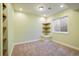 Carpeted bedroom featuring recessed lighting, a window, and floating shelves at 4939 Silver Feather Cir, Broomfield, CO 80023