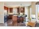 Beautiful kitchen with stainless steel appliances, breakfast bar, and wood cabinets at 4939 Silver Feather Cir, Broomfield, CO 80023