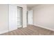 This bedroom has carpet and built-in closet at 676 Fossil Bed Cir, Erie, CO 80516