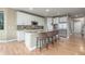 Modern kitchen with granite countertops, stainless appliances and lots of cabinet space at 676 Fossil Bed Cir, Erie, CO 80516