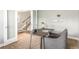 Bright office space with a large window, neutral colors, and a stylish desk at 676 Fossil Bed Cir, Erie, CO 80516
