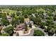 Aerial view of a neighborhood featuring mature trees, lush lawns, and well-maintained homes, highlighting community appeal at 1473 E 130Th Dr, Thornton, CO 80241