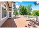 Expansive wooden deck perfect for outdoor gatherings, offering scenic views of the surrounding landscape at 1473 E 130Th Dr, Thornton, CO 80241