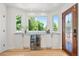 Charming wet bar area with beverage cooler, granite countertop and natural light at 1473 E 130Th Dr, Thornton, CO 80241