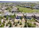 Expansive neighborhood features a beautiful home surrounded by lush greenery and open spaces at 11957 S Swift Fox Way, Parker, CO 80134