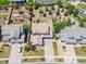 Aerial view of property showcasing the home's layout and landscaping in a residential neighborhood at 11957 S Swift Fox Way, Parker, CO 80134