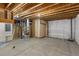 Unfinished basement with exposed ceiling and concrete flooring, perfect for storage or future expansion at 11957 S Swift Fox Way, Parker, CO 80134