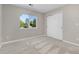 Comfortable bedroom with a large window and closet space at 11957 S Swift Fox Way, Parker, CO 80134