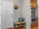 The home's entryway features a door, seating and built-in ovens at 11957 S Swift Fox Way, Parker, CO 80134