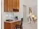 Functional office nook with custom cabinetry, offering a quiet workspace at 11957 S Swift Fox Way, Parker, CO 80134