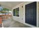 Inviting front porch showcasing the home's entry and an exterior light fixture at 1248 Button Rock Dr, Longmont, CO 80504