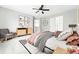 A bedroom with carpet and modern design with modern furnishings and a ceiling fan at 1248 Button Rock Dr, Longmont, CO 80504
