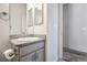 Bathroom with a granite topped vanity and sink at 56582 E 23Rd Ave, Strasburg, CO 80136