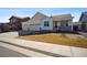Charming single-Gathering home with a three-car garage, well-manicured lawn, and inviting curb appeal at 56582 E 23Rd Ave, Strasburg, CO 80136