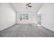 A bright living room with natural light and modern ceiling fan at 56582 E 23Rd Ave, Strasburg, CO 80136