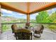 Relaxing balcony with comfortable seating and a beautiful mountain view at 9650 S Cougar Rd, Littleton, CO 80127