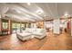 Bright living area with large sliding doors opening to the patio, offering seamless indoor-outdoor living at 9650 S Cougar Rd, Littleton, CO 80127