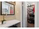Bright closet with ample shelving and storage space is easily accessible, ideal for organization and convenience at 11402 W 17Th Pl, Lakewood, CO 80215