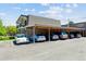 Carport with multiple covered parking spaces, providing convenient and protected vehicle storage at 11402 W 17Th Pl, Lakewood, CO 80215