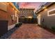 Cozy backyard with brick pavers and twinkling string lights for memorable outdoor moments at 1730 N Gaylord St, Denver, CO 80206