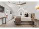Bright bedroom features neutral tones, soft carpet, a ceiling fan, and ample natural light at 1730 N Gaylord St, Denver, CO 80206