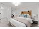 Comfortable bedroom featuring soft textures, bright lighting and a stylish wooden headboard at 1730 N Gaylord St, Denver, CO 80206
