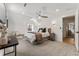 Bright bedroom features neutral tones, soft carpet, and a view from the window at 1730 N Gaylord St, Denver, CO 80206