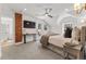 Charming bedroom with neutral tones, exposed brick, and a view from the sliding glass door at 1730 N Gaylord St, Denver, CO 80206