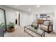 Cozy living room with stylish wet bar, comfortable seating, and recessed lighting at 1730 N Gaylord St, Denver, CO 80206