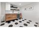 Stylish wet bar with modern cabinets, tiled backsplash, and beverage cooler at 1730 N Gaylord St, Denver, CO 80206
