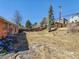 Open backyard space with a wooden fence, showcasing the property's outdoor potential at 4291 W Wagon Trail Dr, Littleton, CO 80123