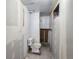 Bathroom awaiting remodel, equipped with toilet and window in an unfinished basement at 4291 W Wagon Trail Dr, Littleton, CO 80123