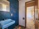Bathroom with a retro sink and faucet that needs remodeling, offering renovation potential at 4291 W Wagon Trail Dr, Littleton, CO 80123