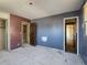 Spacious bedroom with an attached closet, in need of remodeling and painting at 4291 W Wagon Trail Dr, Littleton, CO 80123