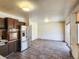 Spacious kitchen area with room for customization, featuring stainless steel appliances at 4291 W Wagon Trail Dr, Littleton, CO 80123