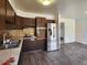 Kitchen with vintage cabinetry, offering potential for a modern upgrade and renovation at 4291 W Wagon Trail Dr, Littleton, CO 80123
