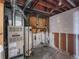 Utility room with a furnace and water heater, ready for updates and renovation at 4291 W Wagon Trail Dr, Littleton, CO 80123