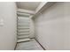 Walk-in closet featuring built-in shelving for optimal storage and organization at 650 Olympia Ave, Longmont, CO 80504