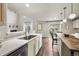 Bright kitchen with a large sink, modern fixtures, and a breakfast bar at 650 Olympia Ave, Longmont, CO 80504