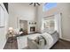 Cozy living room with a fireplace, large window, and a comfortable sofa, perfect for relaxation and entertaining at 650 Olympia Ave, Longmont, CO 80504