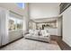 Bright living room boasts high ceilings and large windows that allow ample natural light to fill the space at 650 Olympia Ave, Longmont, CO 80504
